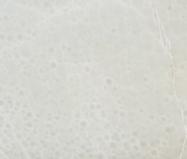 Detallo técnico: ONYX WHITE BUBBLE, mármol natural pulido de Pakistán 